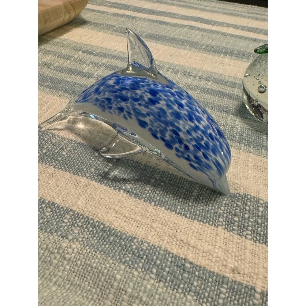 Two glass dolphin paperweights